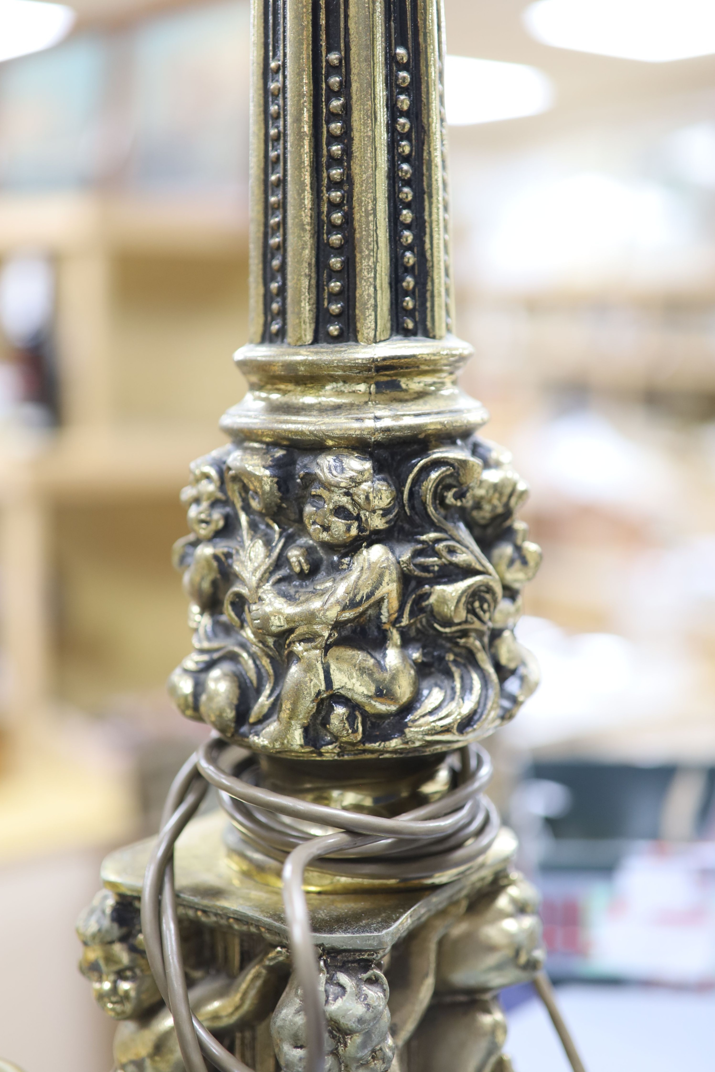 A pair of gilt metal column lamp bases, total height 61 cm